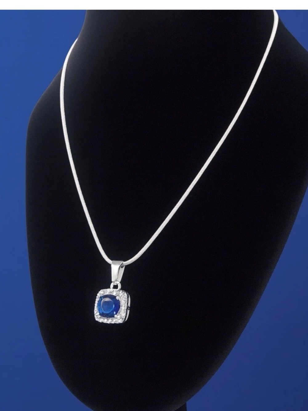 Blue Topaz Pendant w Halo Accents